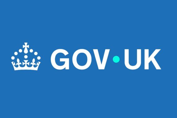 The new GOV.UK logo and wordmark - the Tudor Crown with GOV.UK written next to it, with a light blue coloured dot up in the middle between GOV and UK on a blue background.